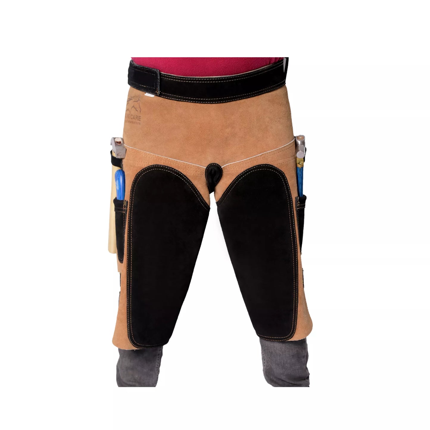 Equine Care Front view of 25-inch Premium Elite Farrier Apron featuring tan leather body, black reinforced thigh panels, adjustable waist belt, and integrated tool holders for professional horse shoeing and farrier work