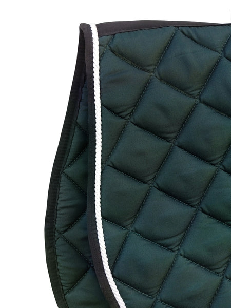 Diamond-stitched quilting and reinforced trim on bottle green Equine Care saddle pad