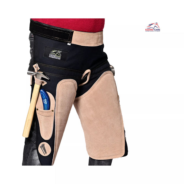 Side view of Femme Farrier Apron 25-inch showing beige suede thigh protection, black waist support, hammer loop, and integrated tool pockets designed for women farriers during horse shoeing work