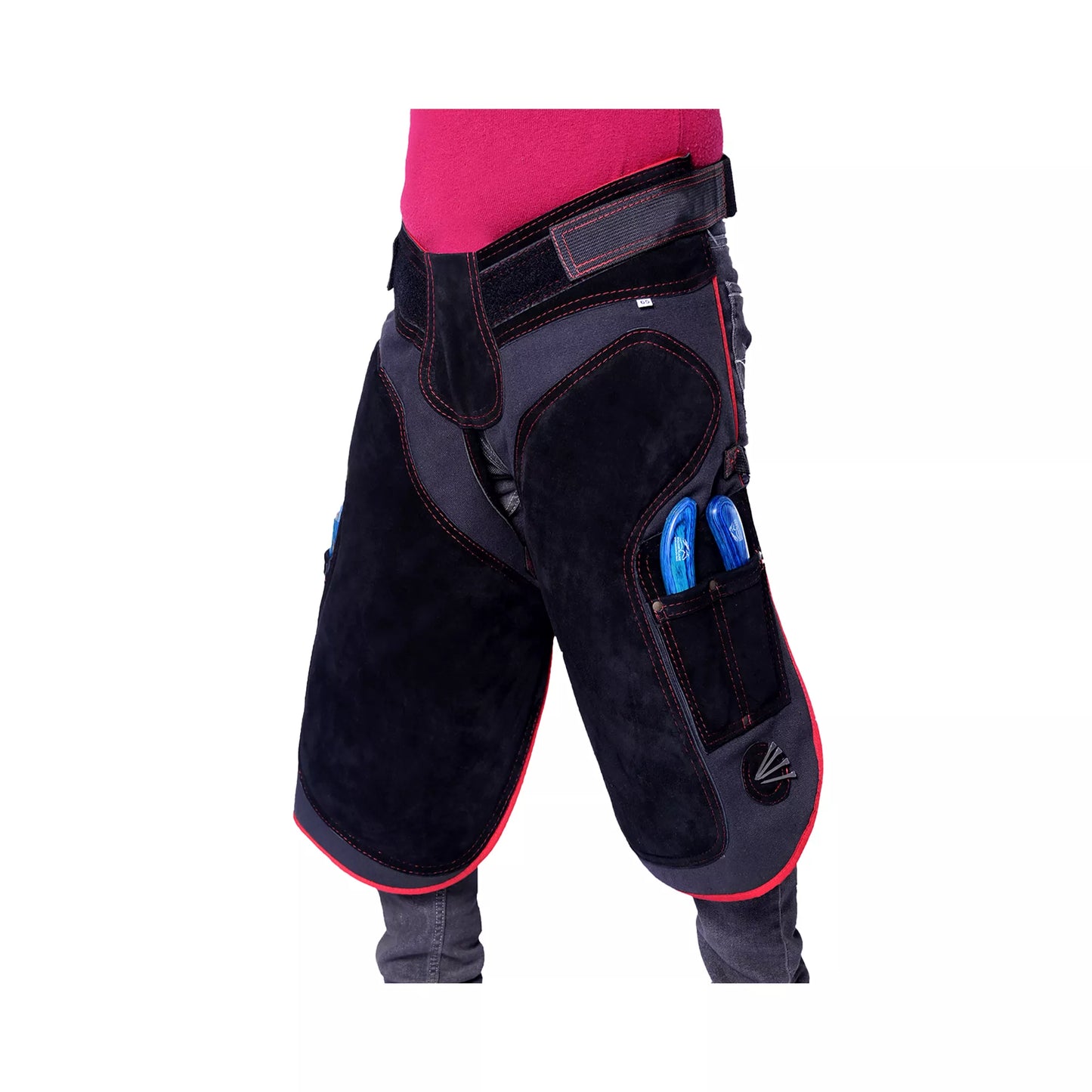Equine Care Pro Artisan Farrier Apron Angled front view of black farrier chaps featuring red trim, reinforced thigh padding, adjustable waist belt, and dual side tool pockets for professional horse shoeing and hoof care work