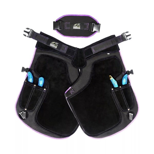 A breathable women’s farrier apron Black with purple Pipingfeaturing a 23-inch ergonomic cut, magnetic nail holders, and knife pockets, leather & canvas
